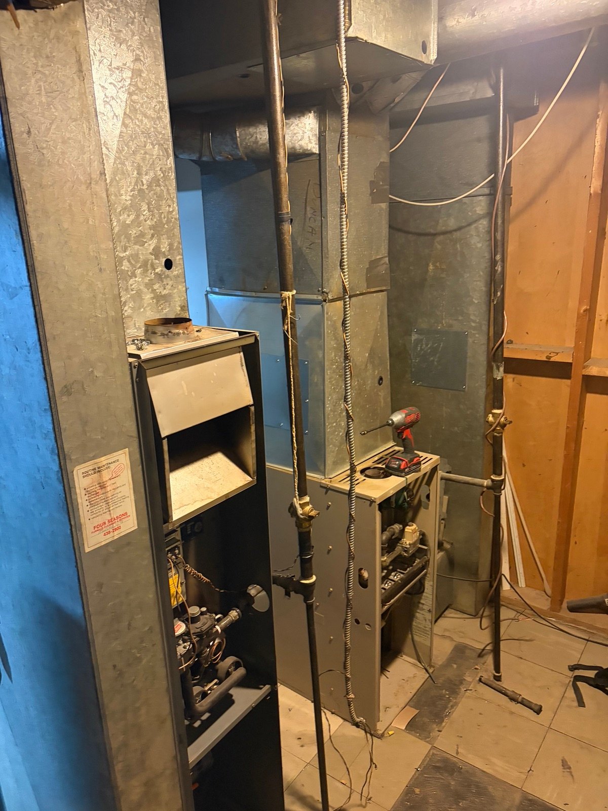 Furnace mechanical room before Jackson Heating and Cooling's work